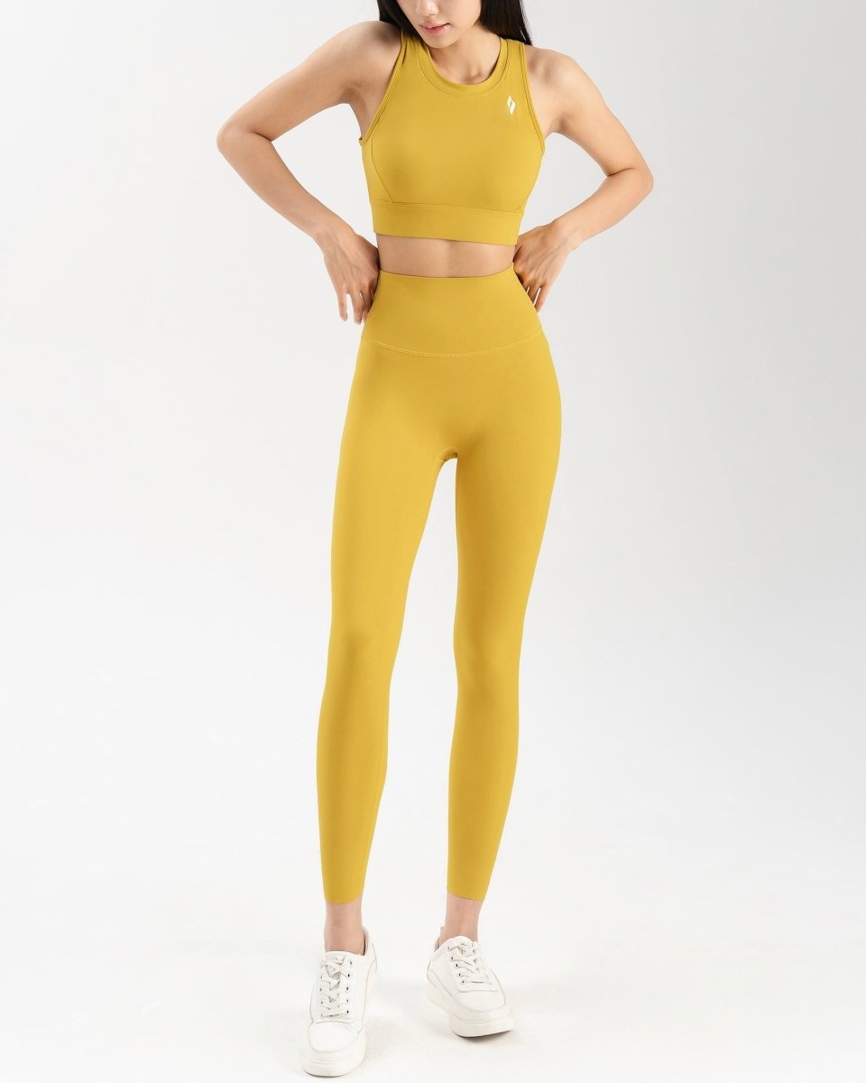 front side of women's activewear set in mustard yellow