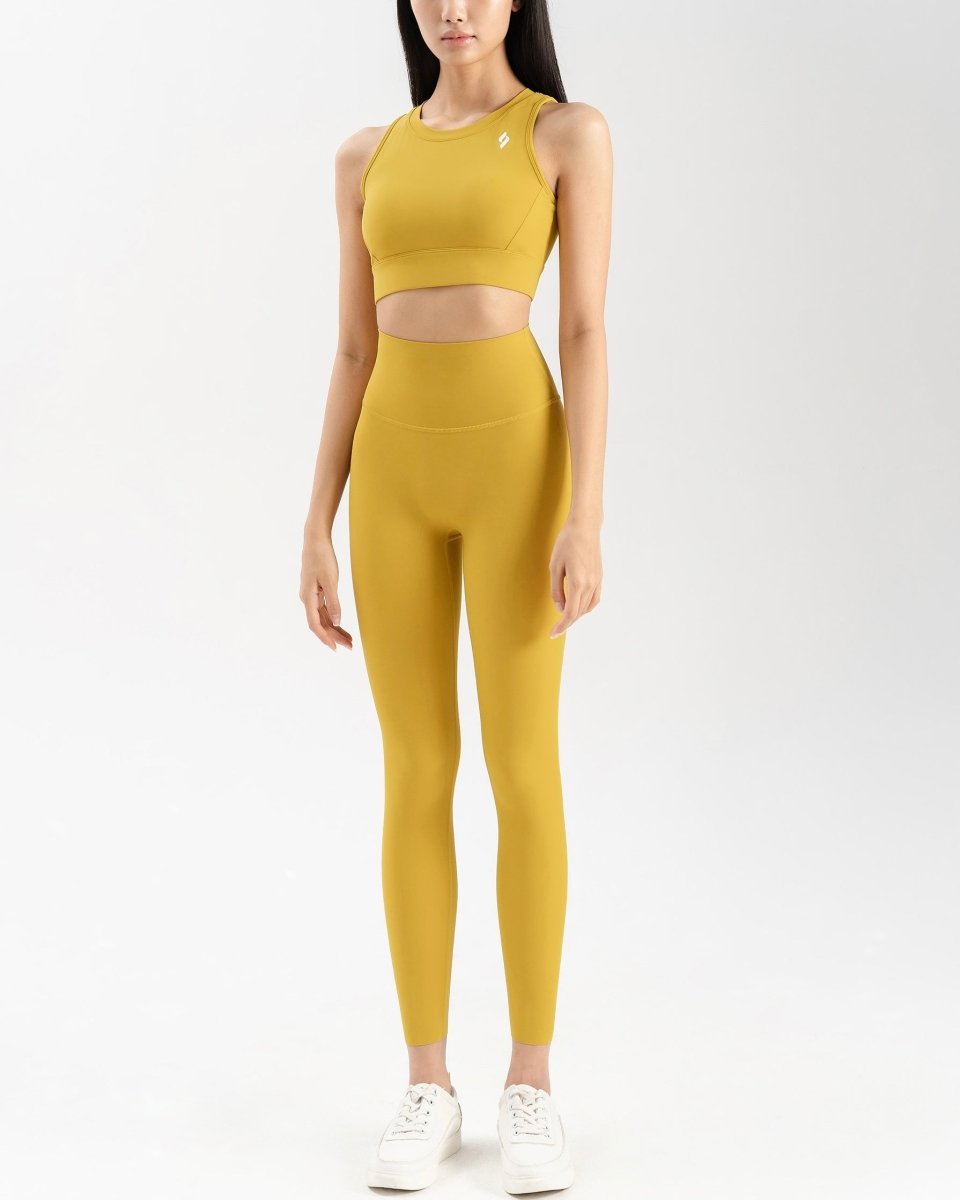 front side of women's activewear set in mustard yellow